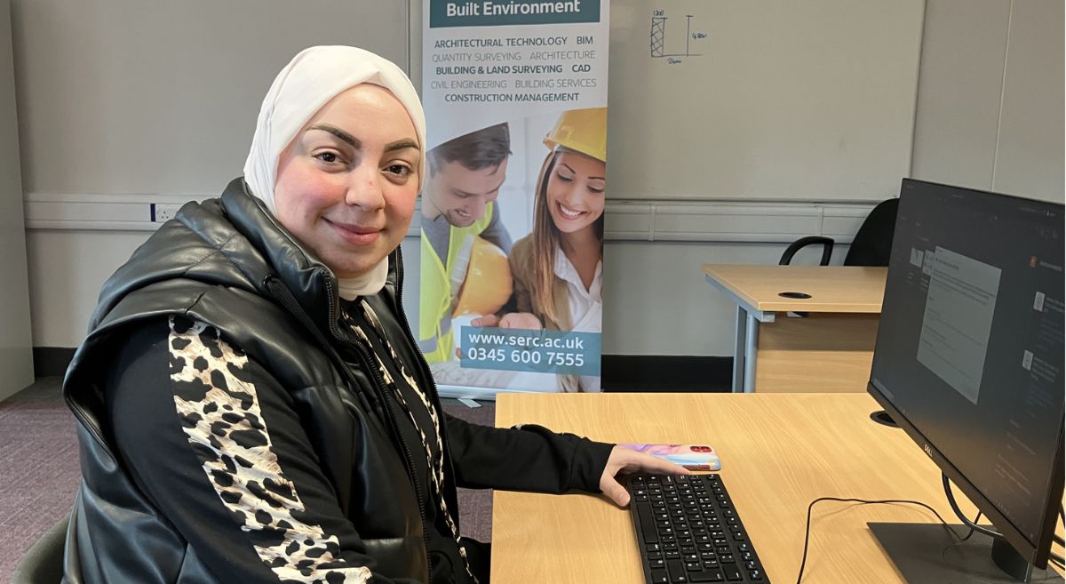 Student Baraa Salaho sits at the computer as she prepares to complete her L3 course in Construction and the Built Environment